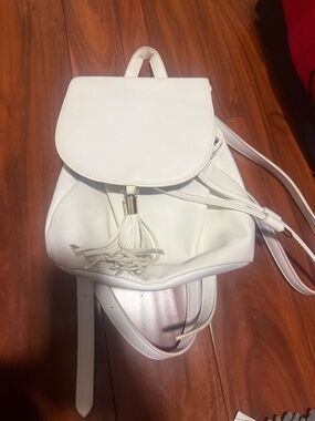 Forever 21 White Tassel Drawstring Mini Backpack